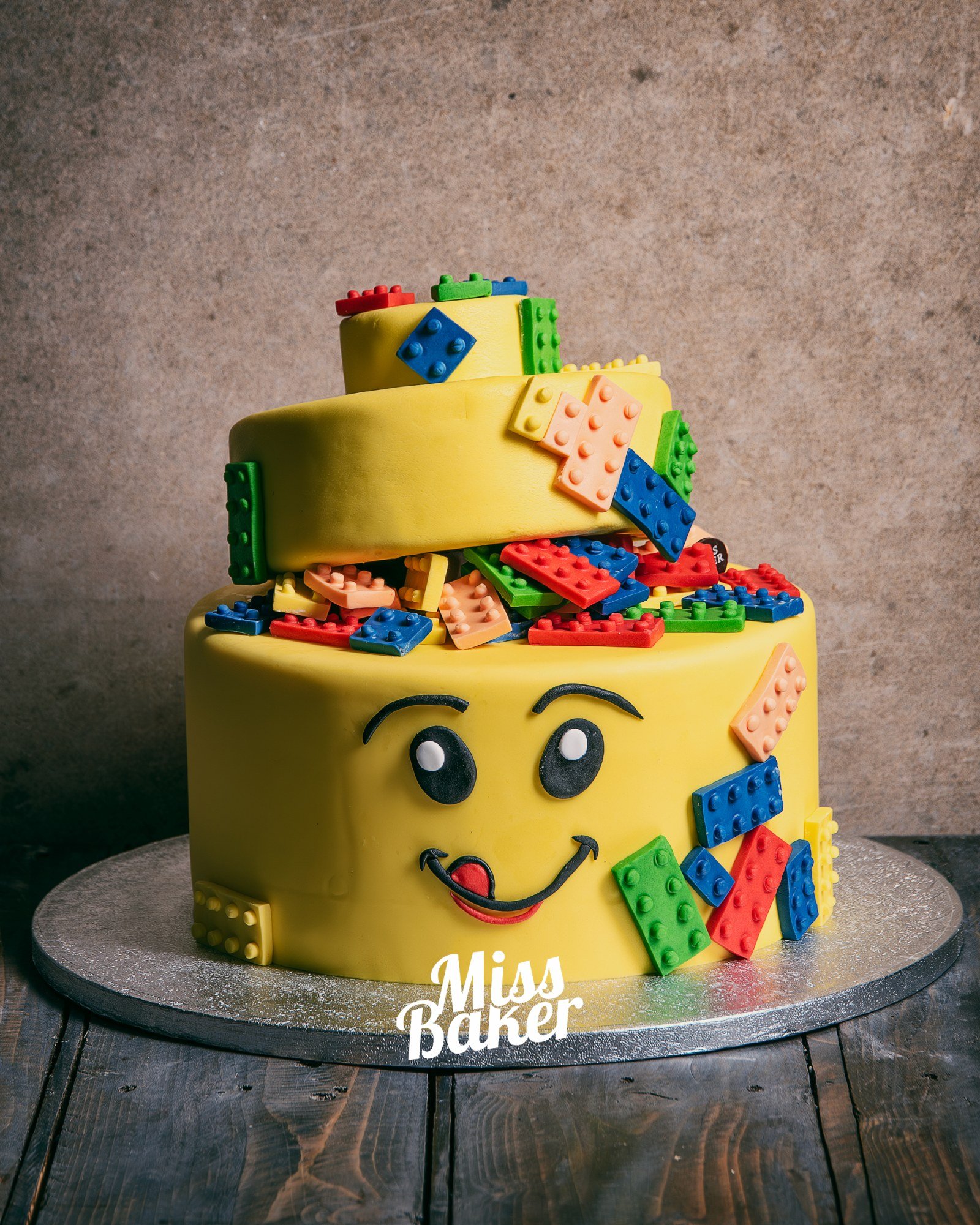 Toturi pentru copii — spirală galbenă, față desenată, piese construcție colorate — Miss Baker Constanța