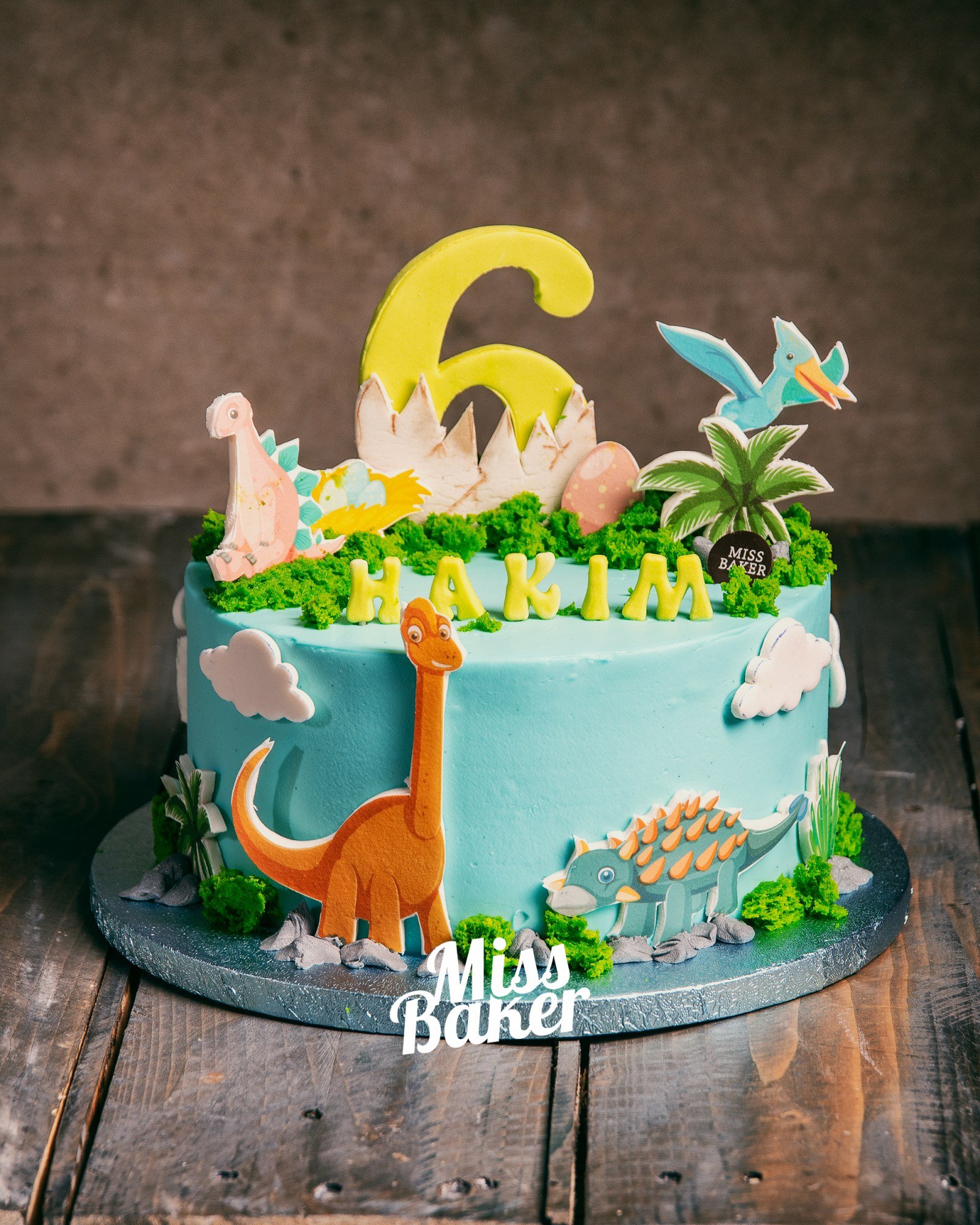 Toturi pentru copii — figurina dinozaur portocaliu, figurina dinozaur verde, figurina dinozaur roz — Miss Baker Constanța