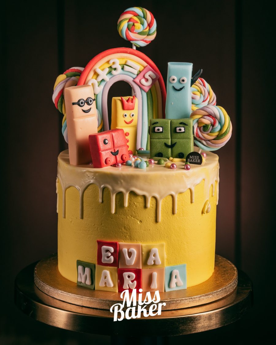 glazură galbenă, figurine geometrice, personaje cu fețe zâmbitoare — Miss Baker Constanța