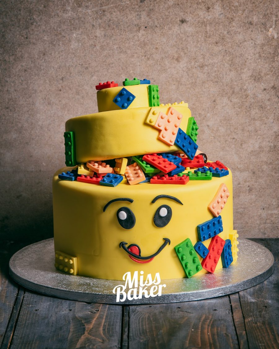 spirală galbenă, față desenată, piese construcție colorate — Miss Baker Constanța